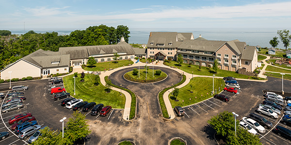 exterior view from above of the front of the lodge at geneva on the lake